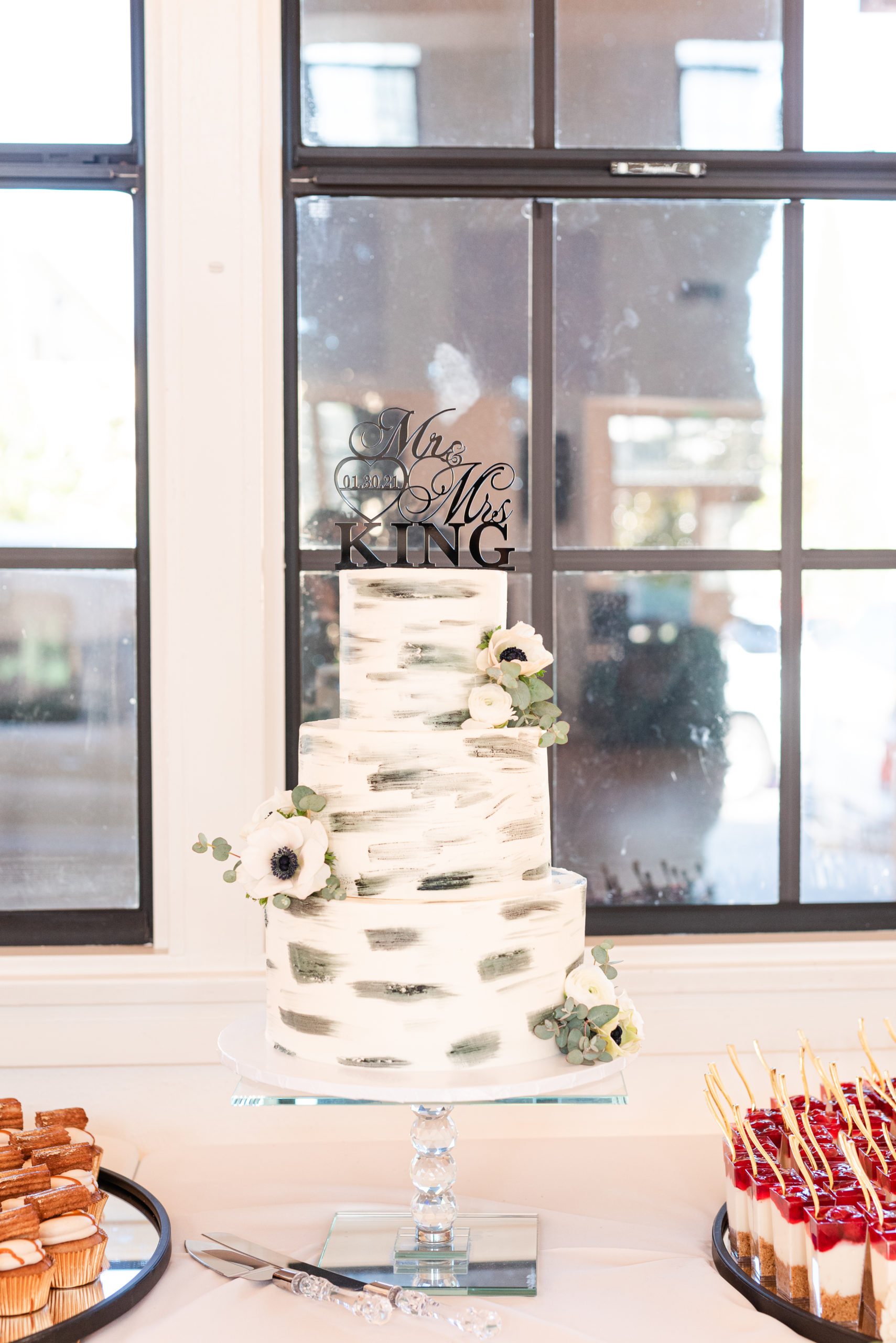 white wedding cake at wedding reception